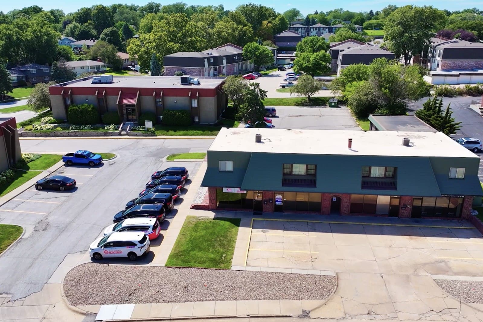 Some of the A-Life Medical Transport fleet parked outside the Omaha office.